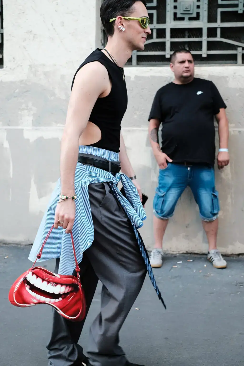A guest arriving at JW Anderson fashion show during Milan Fashion Week Men's 2025 Spring Summer