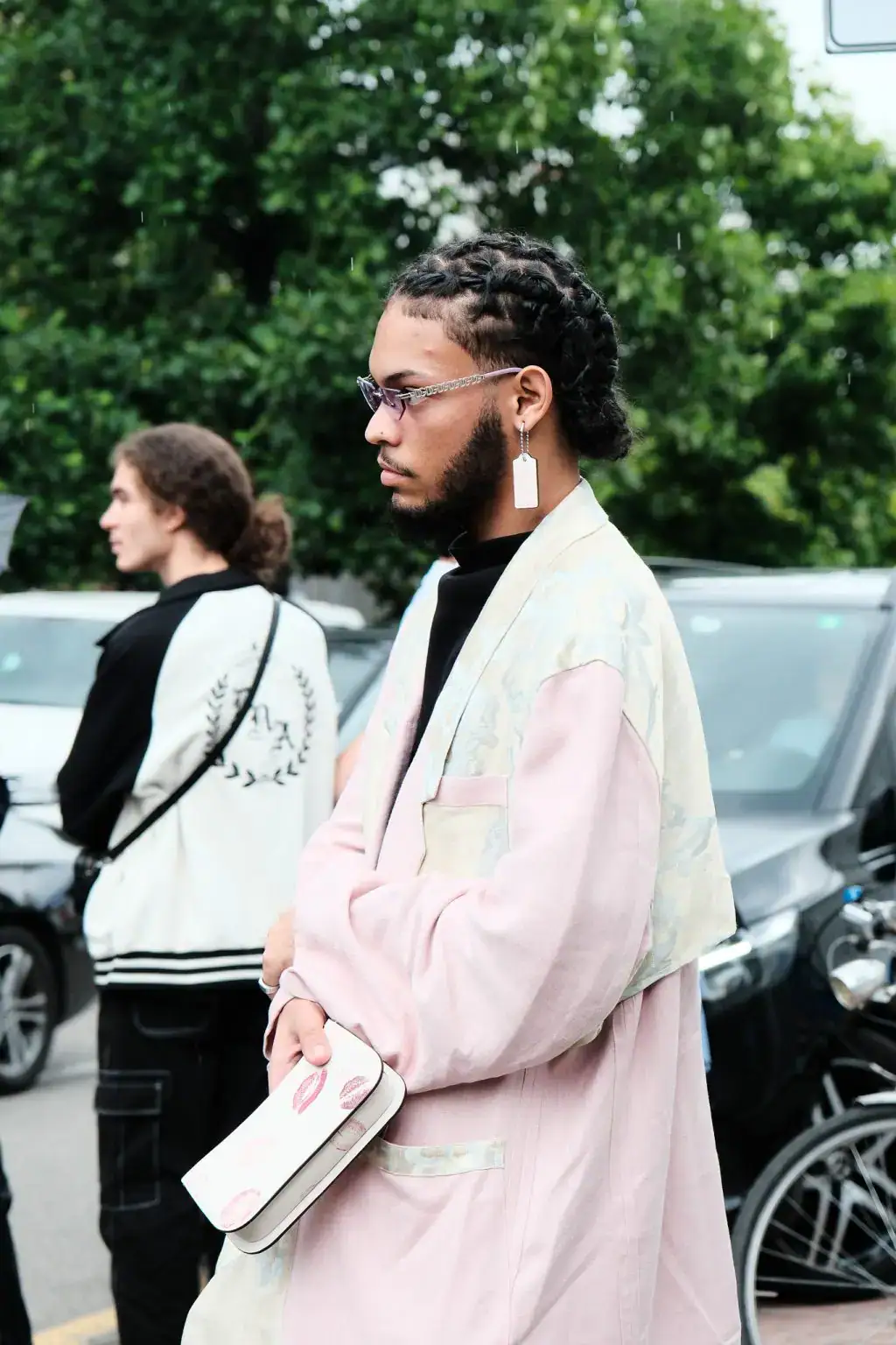 A guest at Fendi's show in Milan Fashion Week Mensewar 2025 Spring/ Summer