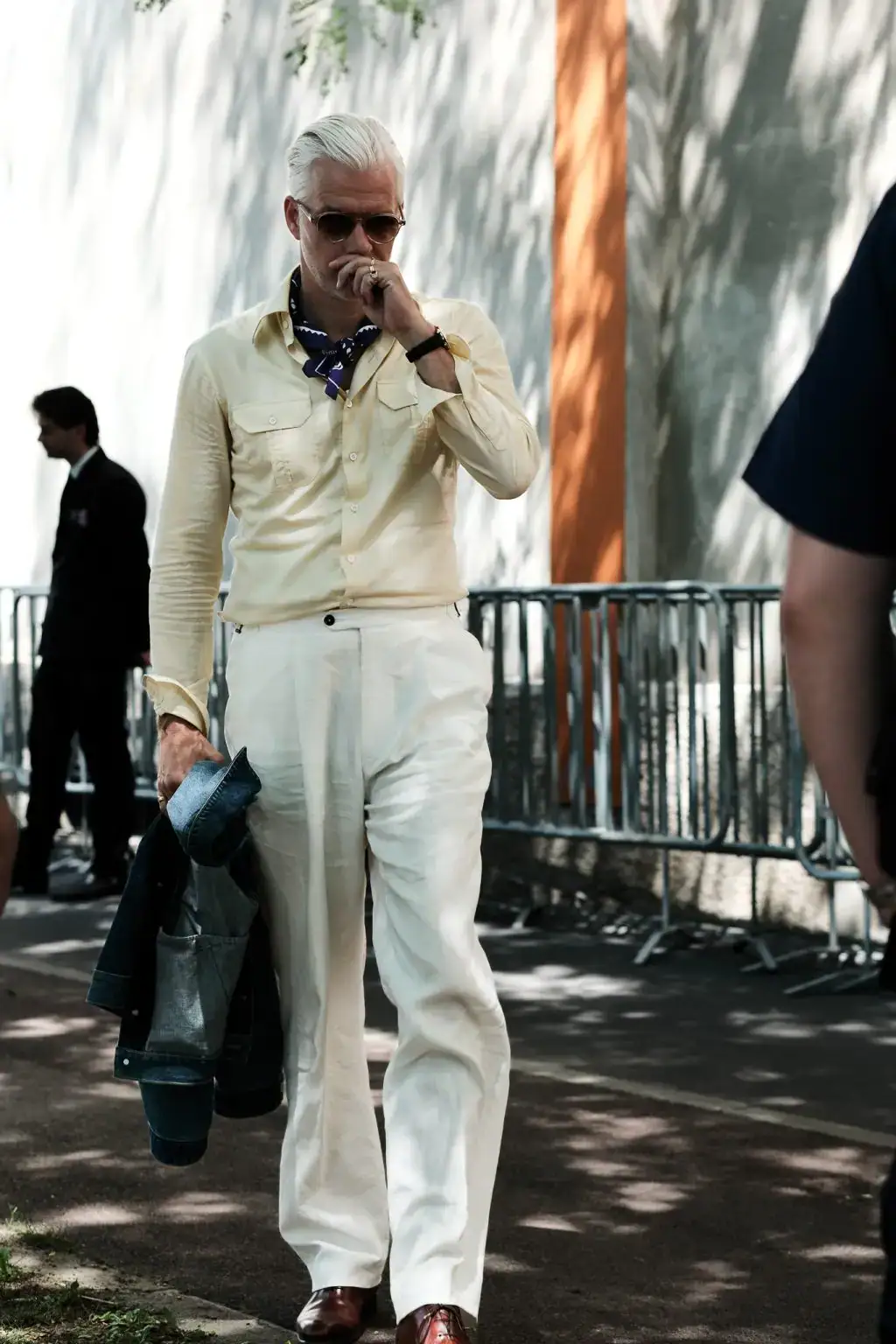 outside Prada, during the Milan Fashion Week Menswear Spring/Summer 2025