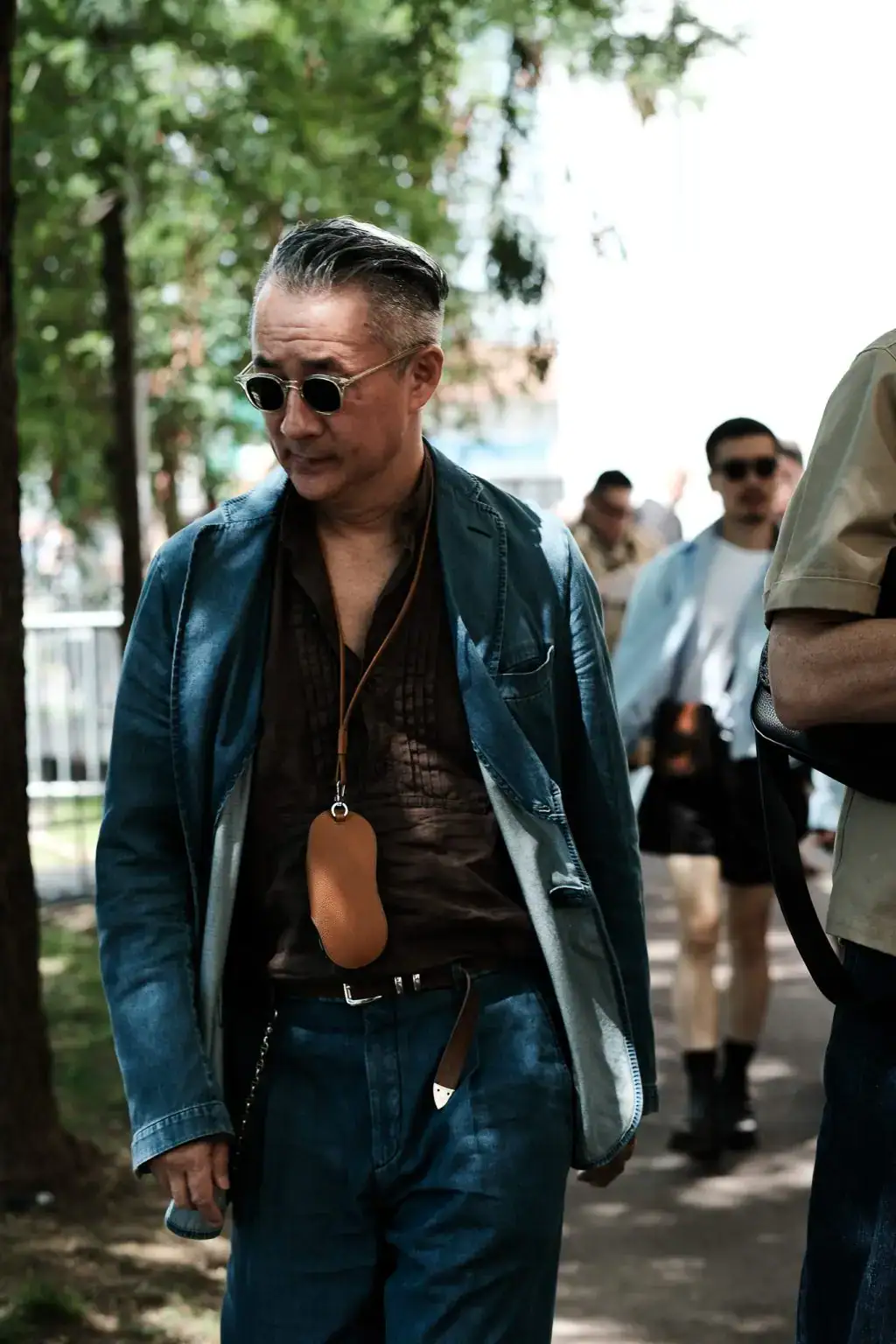 Outside Prada, during the Milan Fashion Week Menswear Spring/Summer 2025
