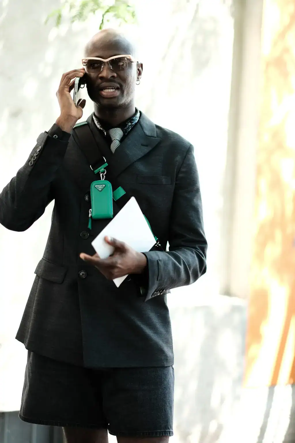 A guest in Prada during Milan Fashion Week Menswear 2025 Spring/Summer by Agnes Select