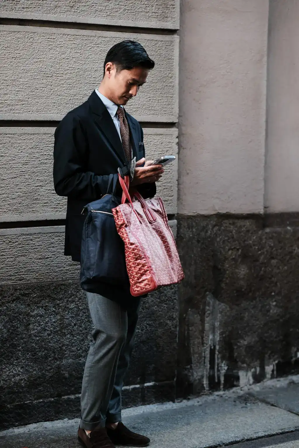 A guest at Dunhill show during Milan Fashion Week 2025 Spring/Summer by Agnes Select
