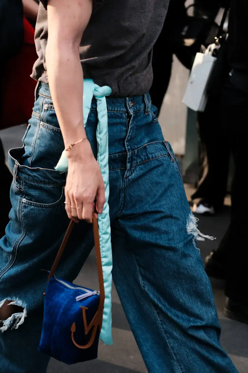 Seungju Han attends the JW Anderson fashion show during the Milan Menswear Spring/Summer 2025 by Agnes Select
